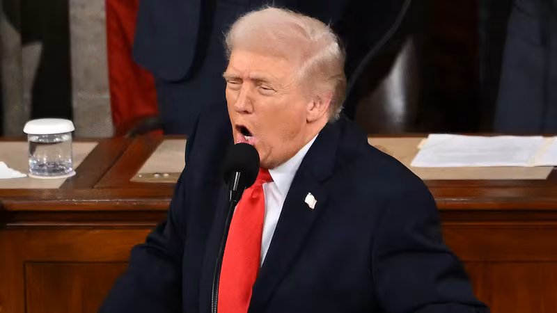 US President Donald Trump delivers the State of the Union address in the House Chamber of the US Capitol in Washington, DC, on February 24, 2026. (Photo by ANDREW CABALLERO-REYNOLDS / AFP via Getty Images)