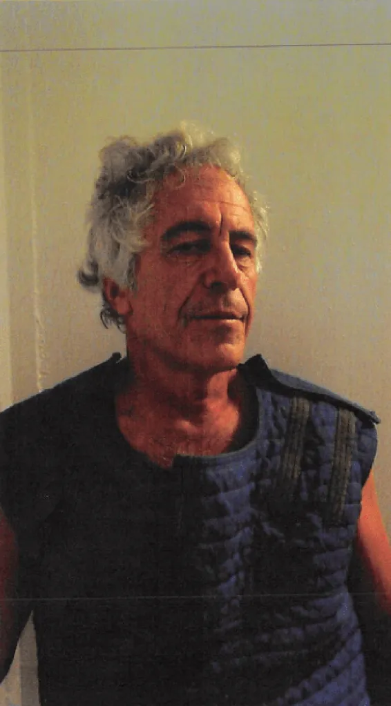 Jeffrey Epstein poses in a Federal Bureau of Prisons investigative document.