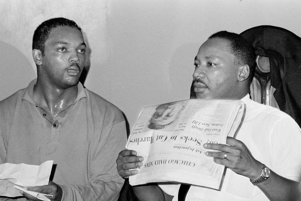 Dr. Martin Luther King Jr. reading a 