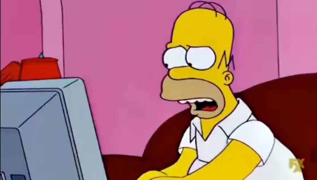 Illustration of Homer Simpson looking shocked and scared while looking at a computer monitor.