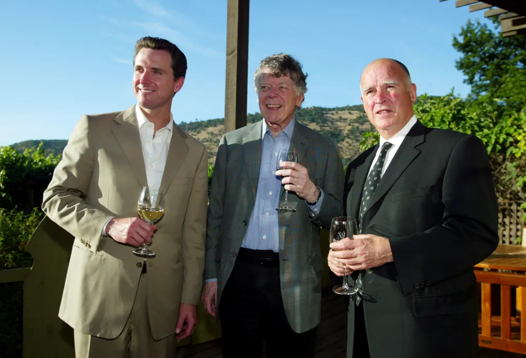 San Francisco Mayor Gavin Newsom, Gordon Getty, and Oakland Mayor Jerry Brown holding wine glasses.