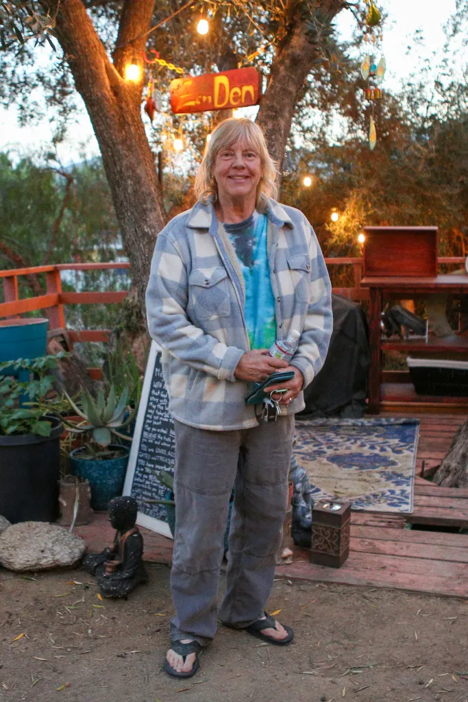 Penny, a 69-year-old woman, standing outdoors.