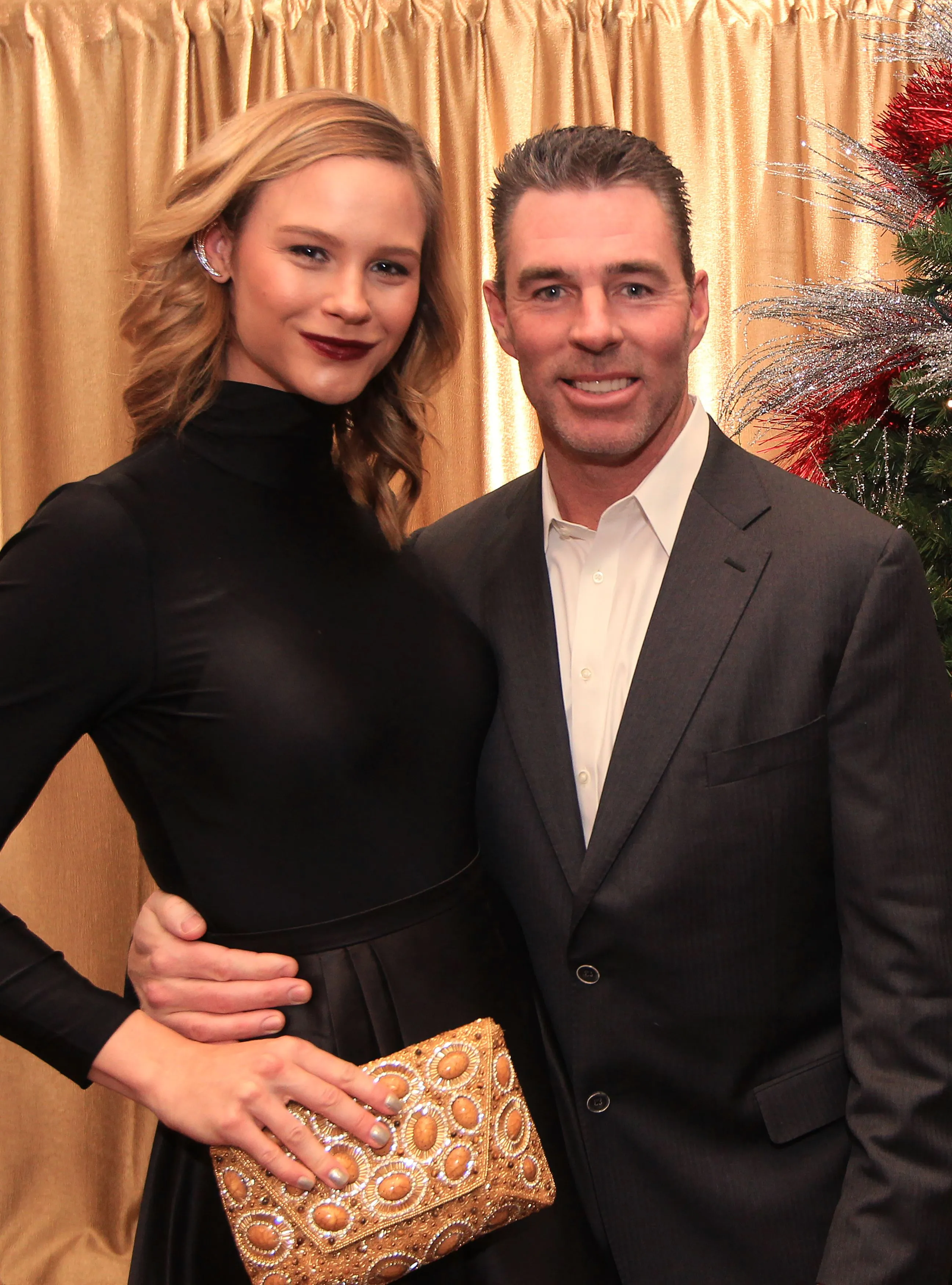 Meghan King Edmonds and former St. Louis Cardinals husband Jim Edmonds pose for a picture at an annual Christmas celebration.