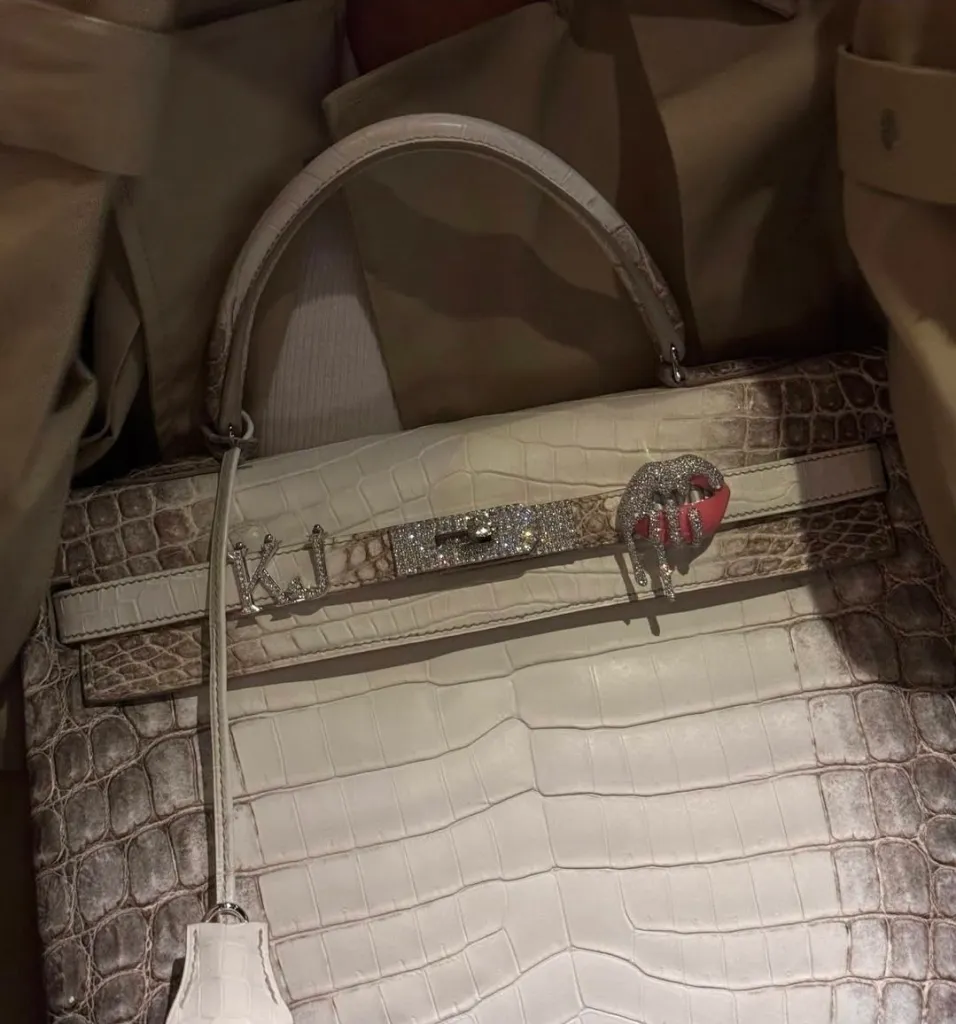 A white crocodile-skin Birkin bag with crystal embellishments and 