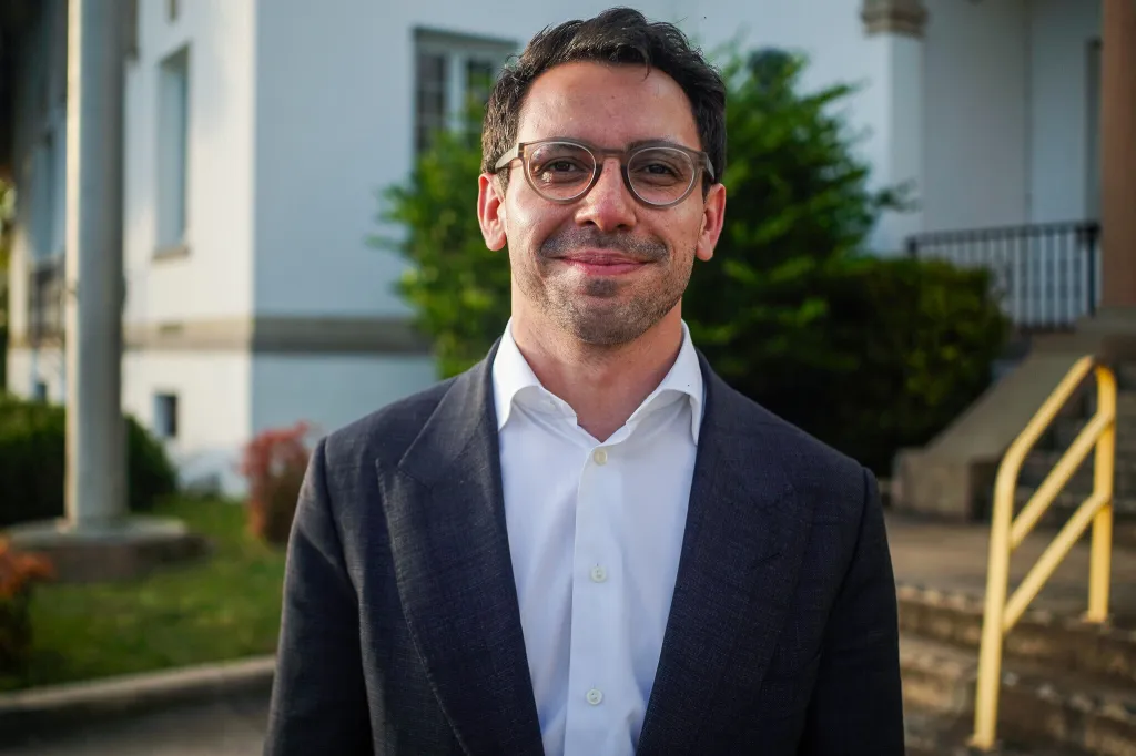 Portrait of James Fishback, a Republican candidate for Florida governor, smiling at the camera.