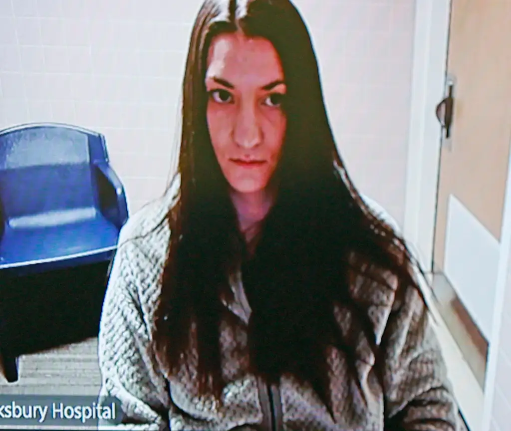 Lindsay Clancy listening to court proceedings from Tewksbury Hospital.