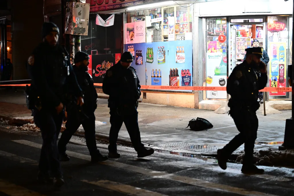 Police tape blocks off the intersection near the McDonald’s where the shooting erupted.