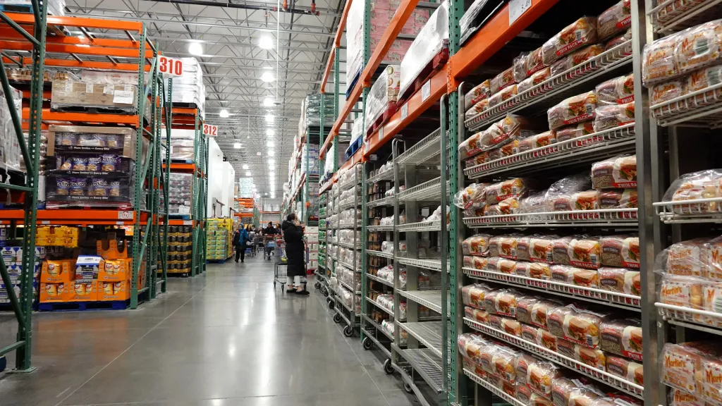 Partially empty bread shelves at a Costco in Bayonne before a major winter storm.