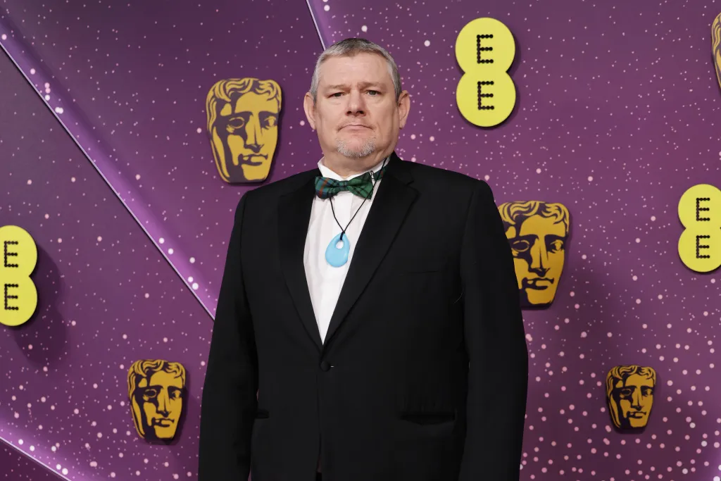John Davidson attending the 2026 EE BAFTA Film Awards.