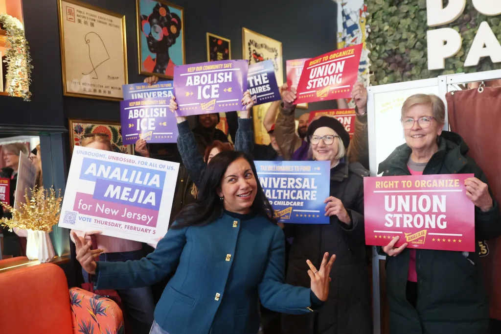 Analilia Mejia takes a photo with supporters at Paper Plane Coffee Co. in Montclair, NJ, on Jan. 29, 2026.