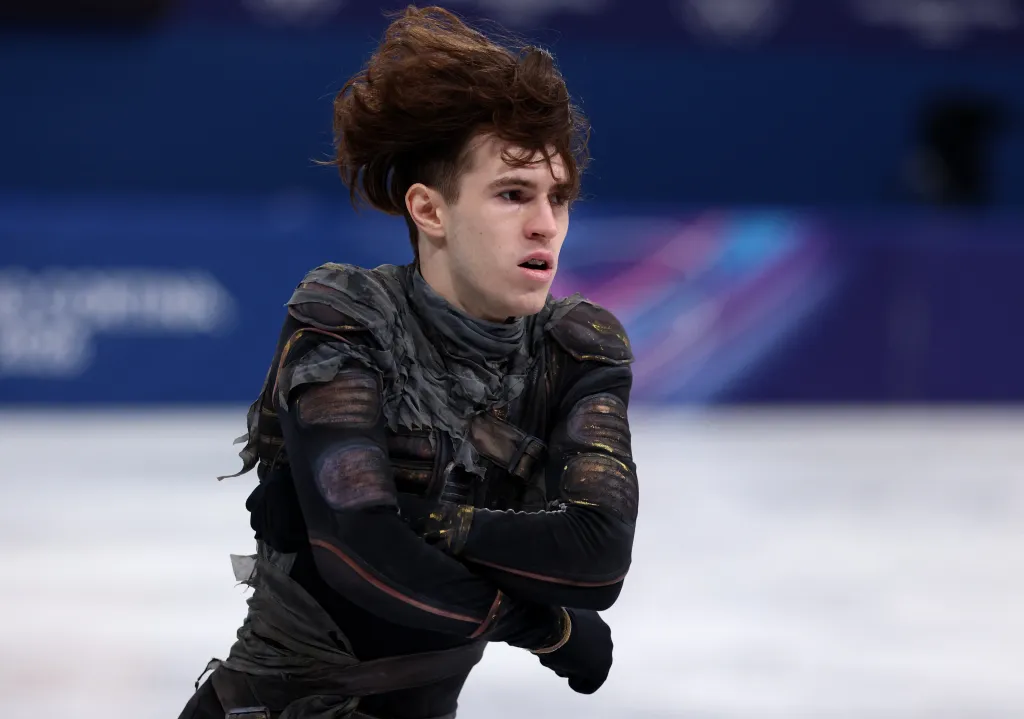 Mikhail Shaidorov performing during the Milano Cortina 2026 Olympics figure skating short program.