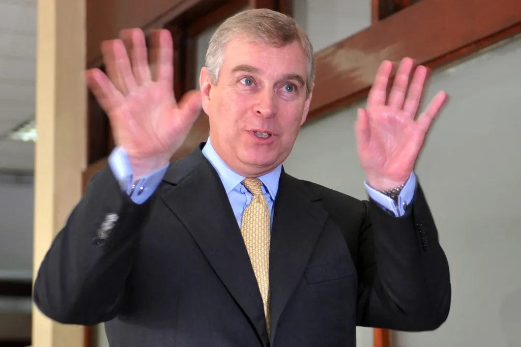 Prince Andrew, Duke of York, waving to the camera.