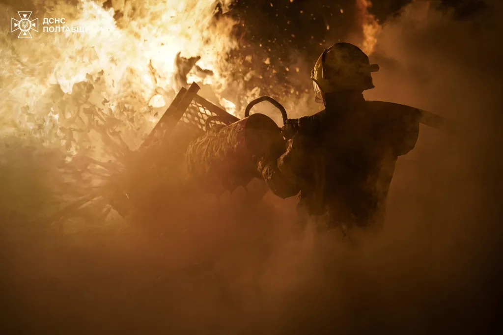 Firefighters battle a blaze after a Ukrainian industrial enterprise was struck by a Russian drone attack on Feb. 6, 2026.