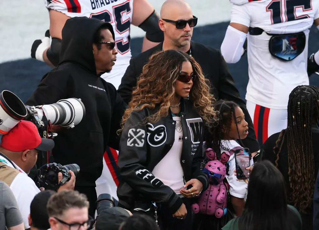 Recording artist Jay-Z with his daughters Blue Ivy and Rumi Carter before the Super Bowl LX game.
