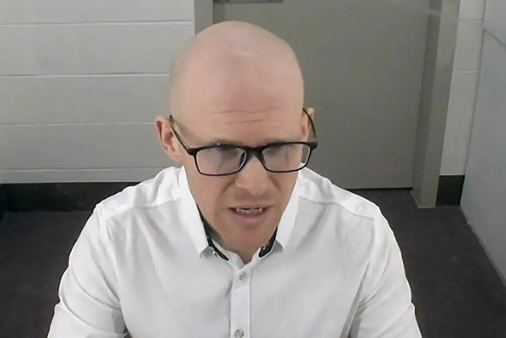 Brenton Tarrant appears before the court by video from Auckland Prison in Auckland.