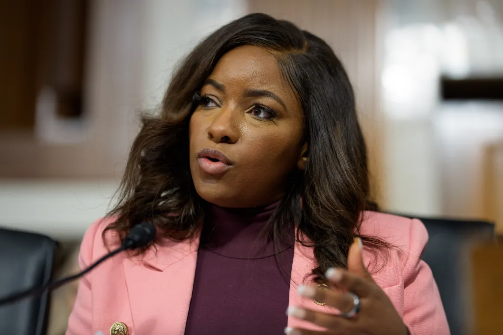 Rep. Jasmine Crockett speaking at a public forum on the violent use of force by Department of Homeland Security agents.