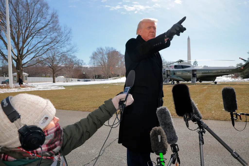 President Trump speaks to the media on the South Lawn before departing for Iowa.
