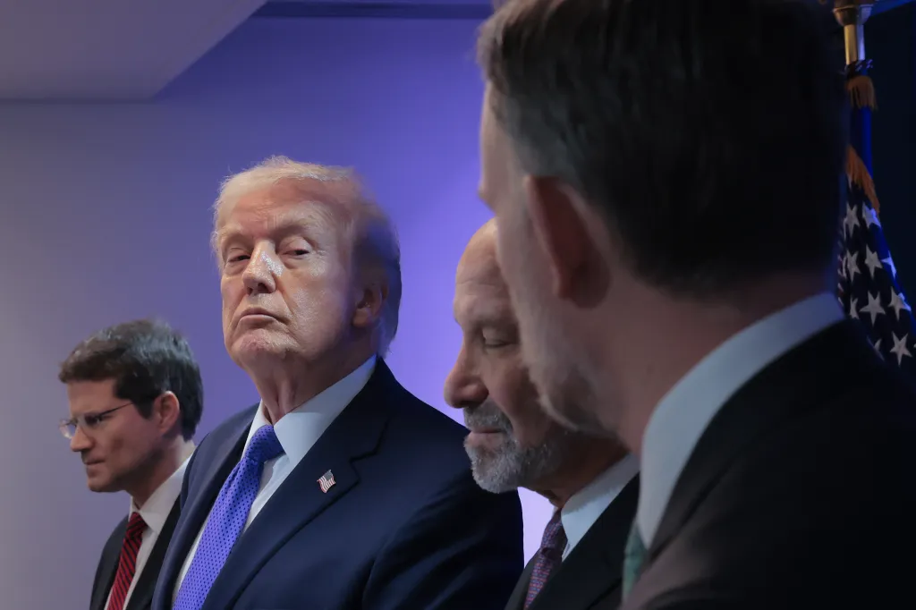 Donald Trump, U.S. Solicitor General John Sauer, Secretary of Commerce Howard Lutnick, and U.S. Trade Representative Jamieson Greer at a press briefing.