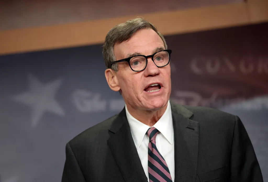 Senate Intelligence Vice Chairman Sen. Mark Warner speaks at a press conference at the Capitol on Feb. 3, 2026.