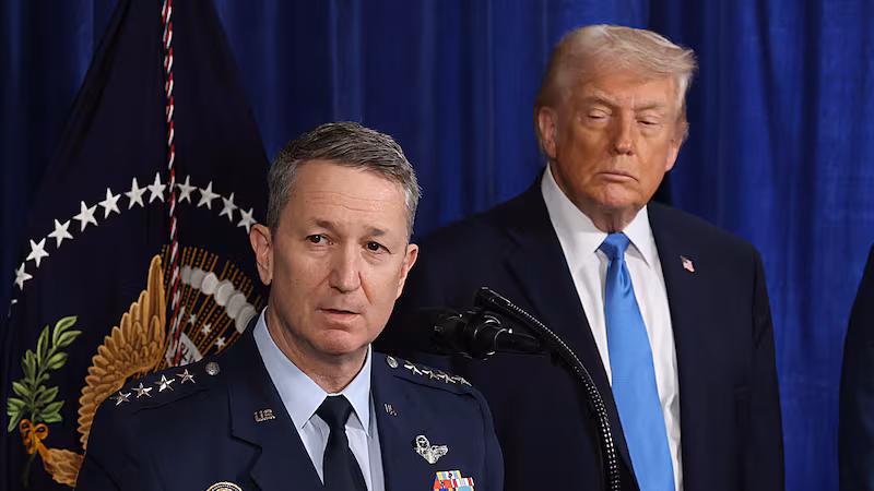 President Donald Trump with his eyes closed as Chairman of the Joint Chiefs of Staff Dan Caine speaks during a press conference at Mar-a-Lago club on January 03, 2026, in Palm Beach, Florida.