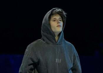 Quad God Dresses Like Mere Mortal