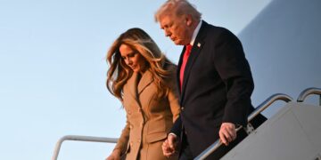Trump Holds On to Melania for Dear Life While Descending AF1 Stairs