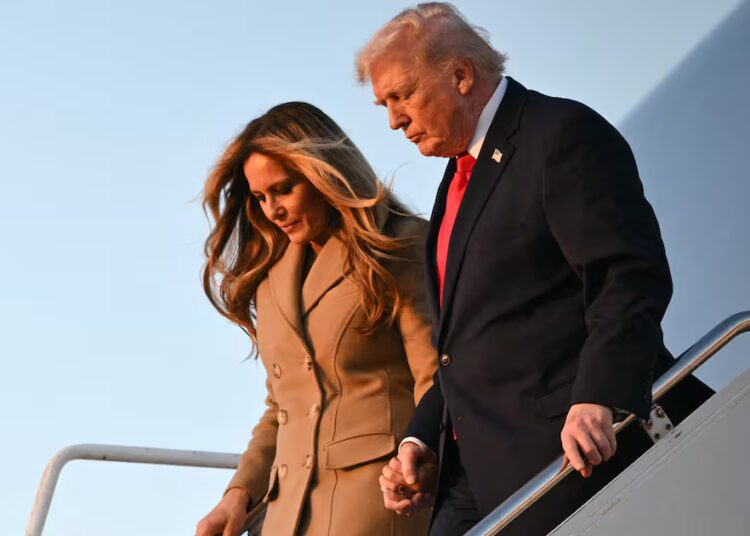 Trump Holds On to Melania for Dear Life While Descending AF1 Stairs