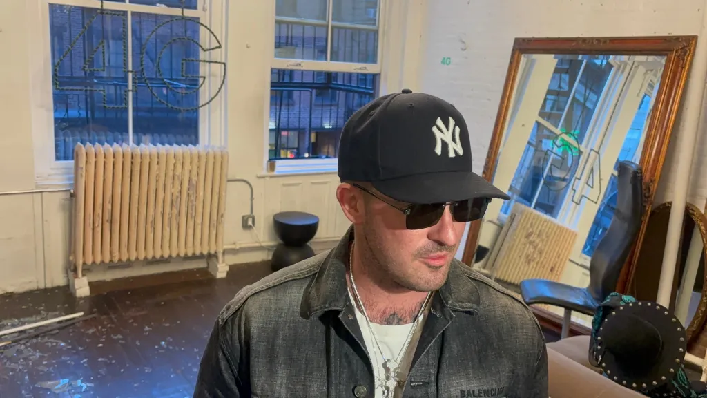 Tommy Macari, partner and brand ambassador for 4G, is shown at the site of a burglary in SoHo.