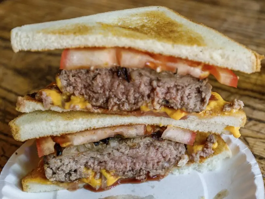 Connecticut hamburger on a plate with two patties
