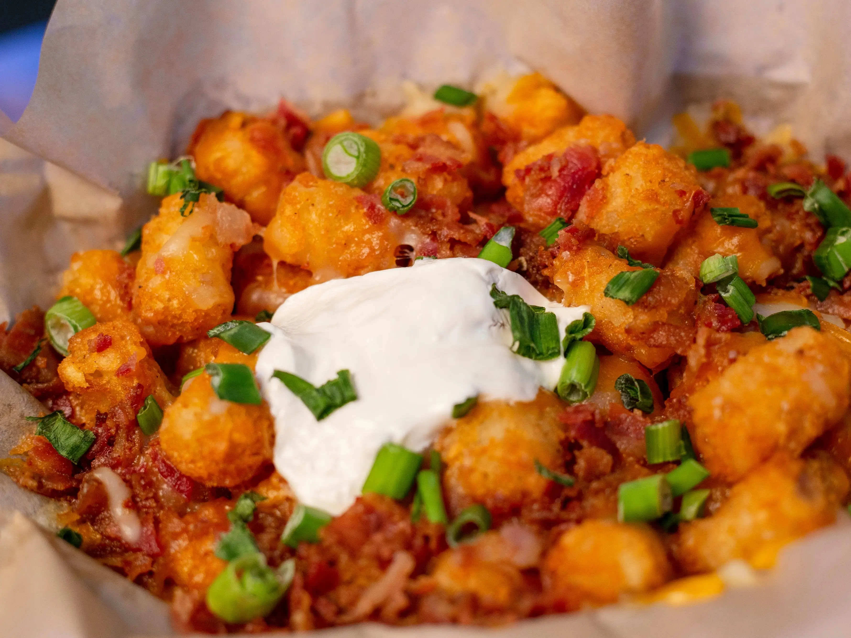 loaded tater tots with sour cream