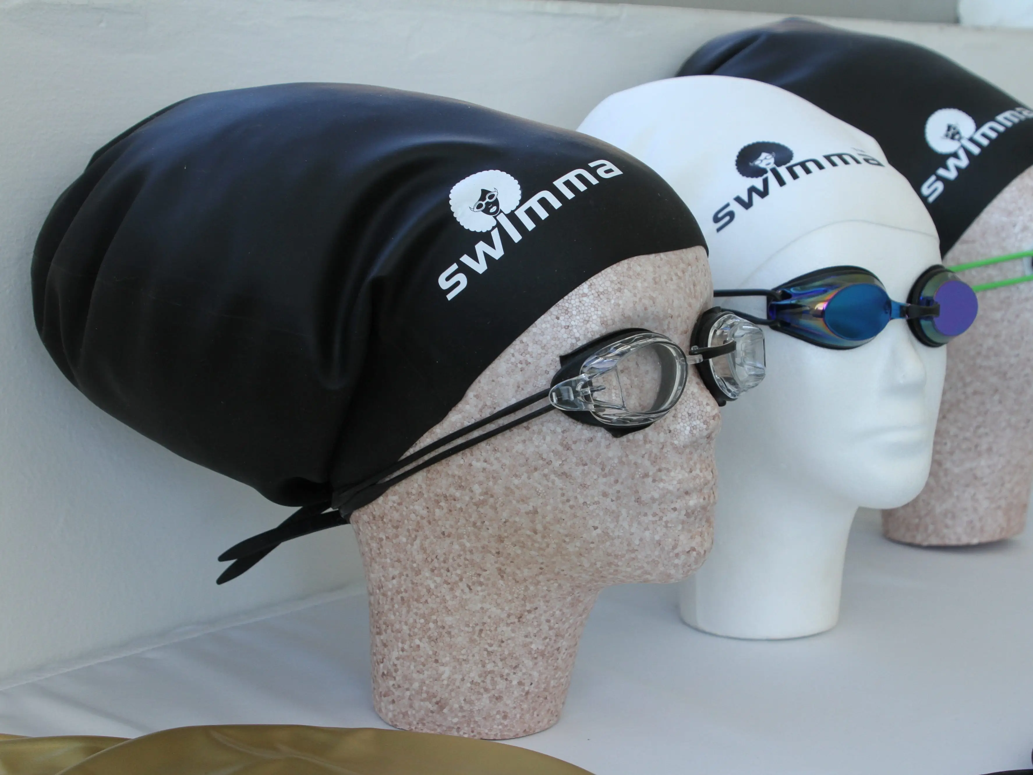 swimming caps for natural hair on display
