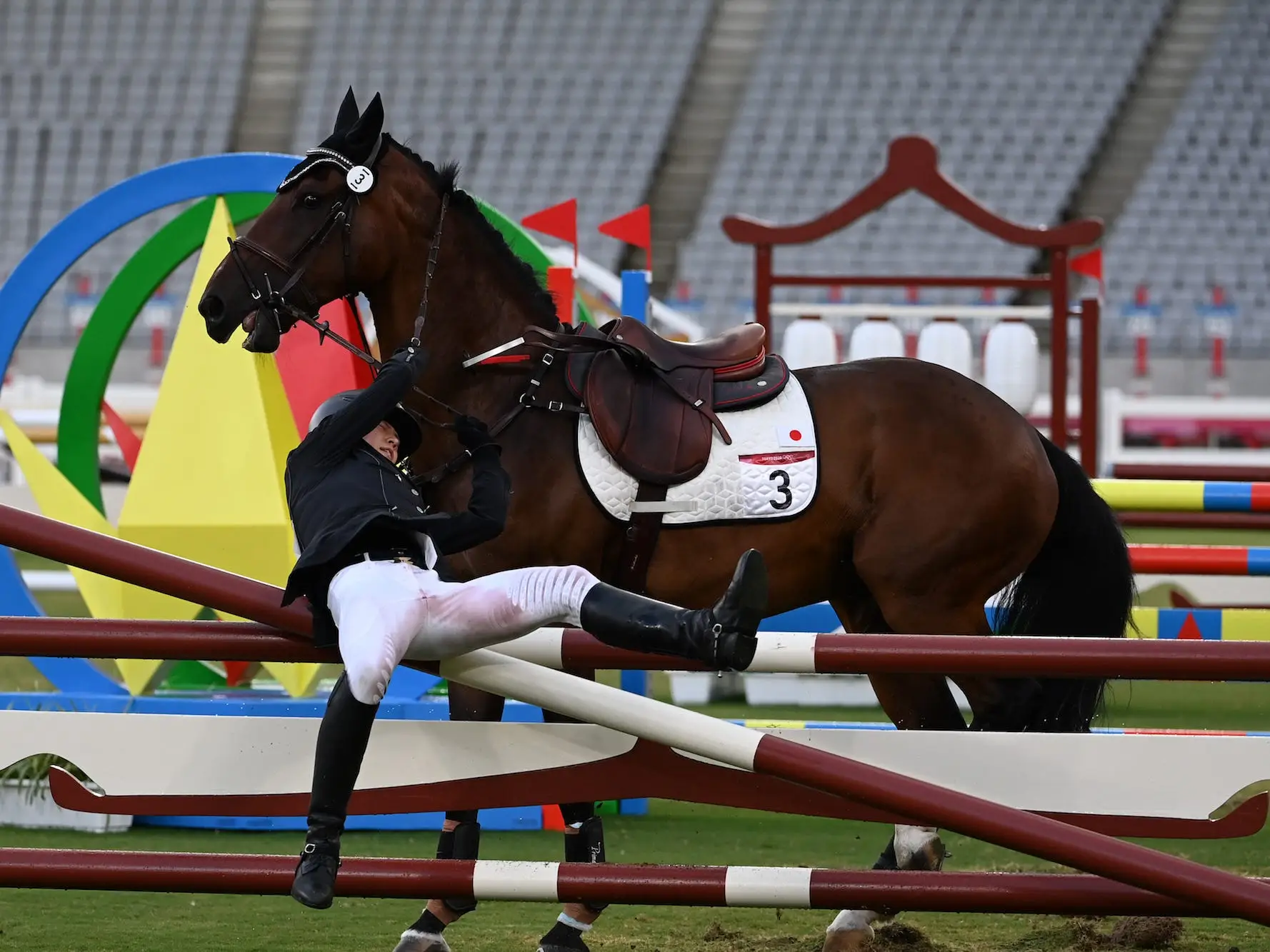 Annika Schleu from Germany falls after her horse refused to jump