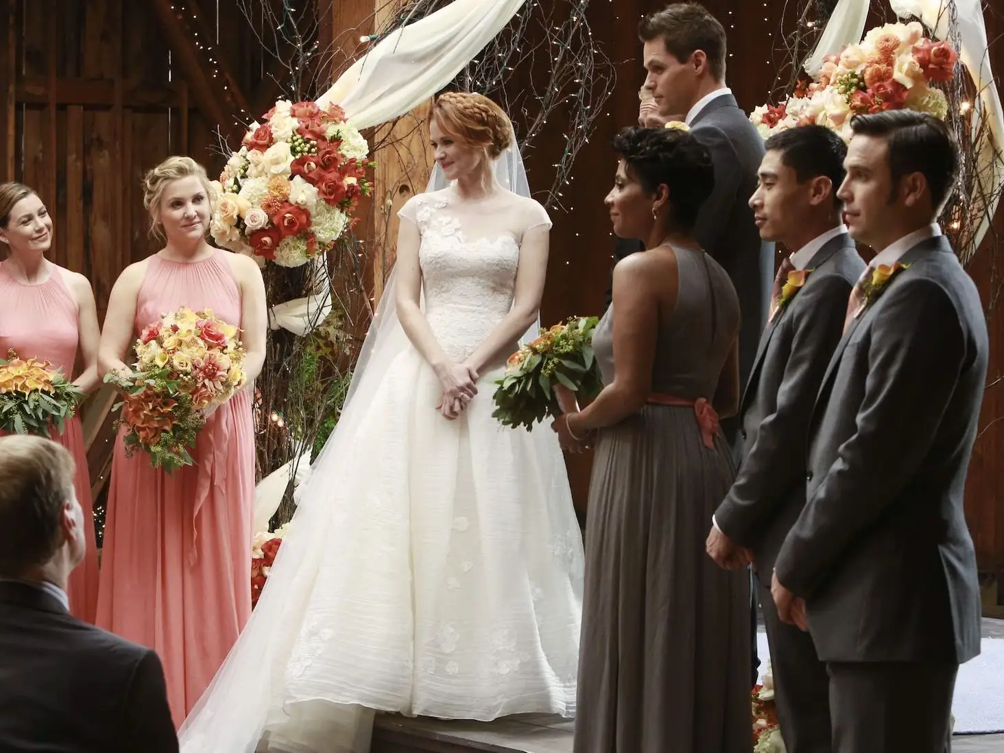April Kepner stands at her wedding altar on 