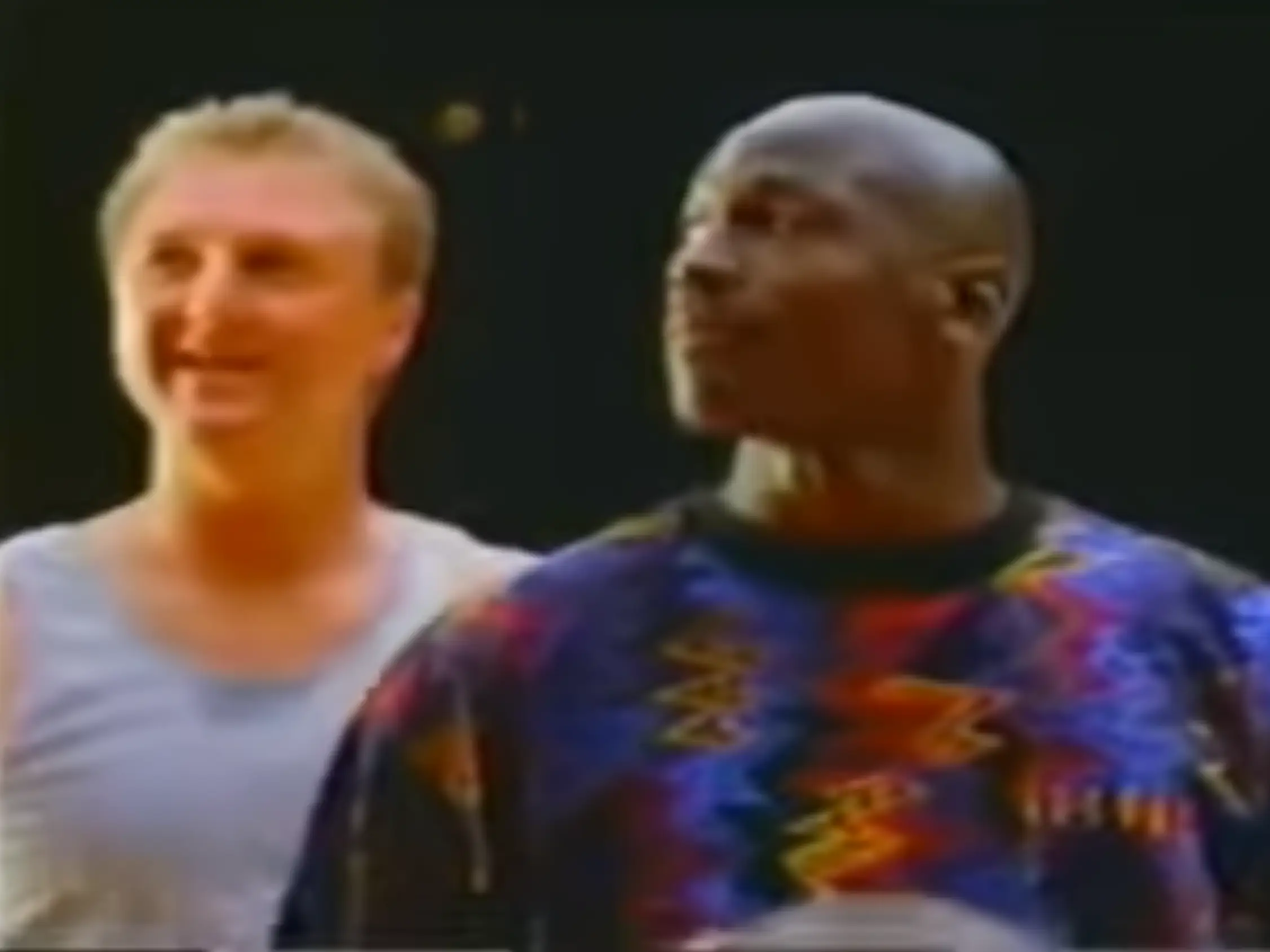 Larry Bird (L) and Michael Jordan (R).