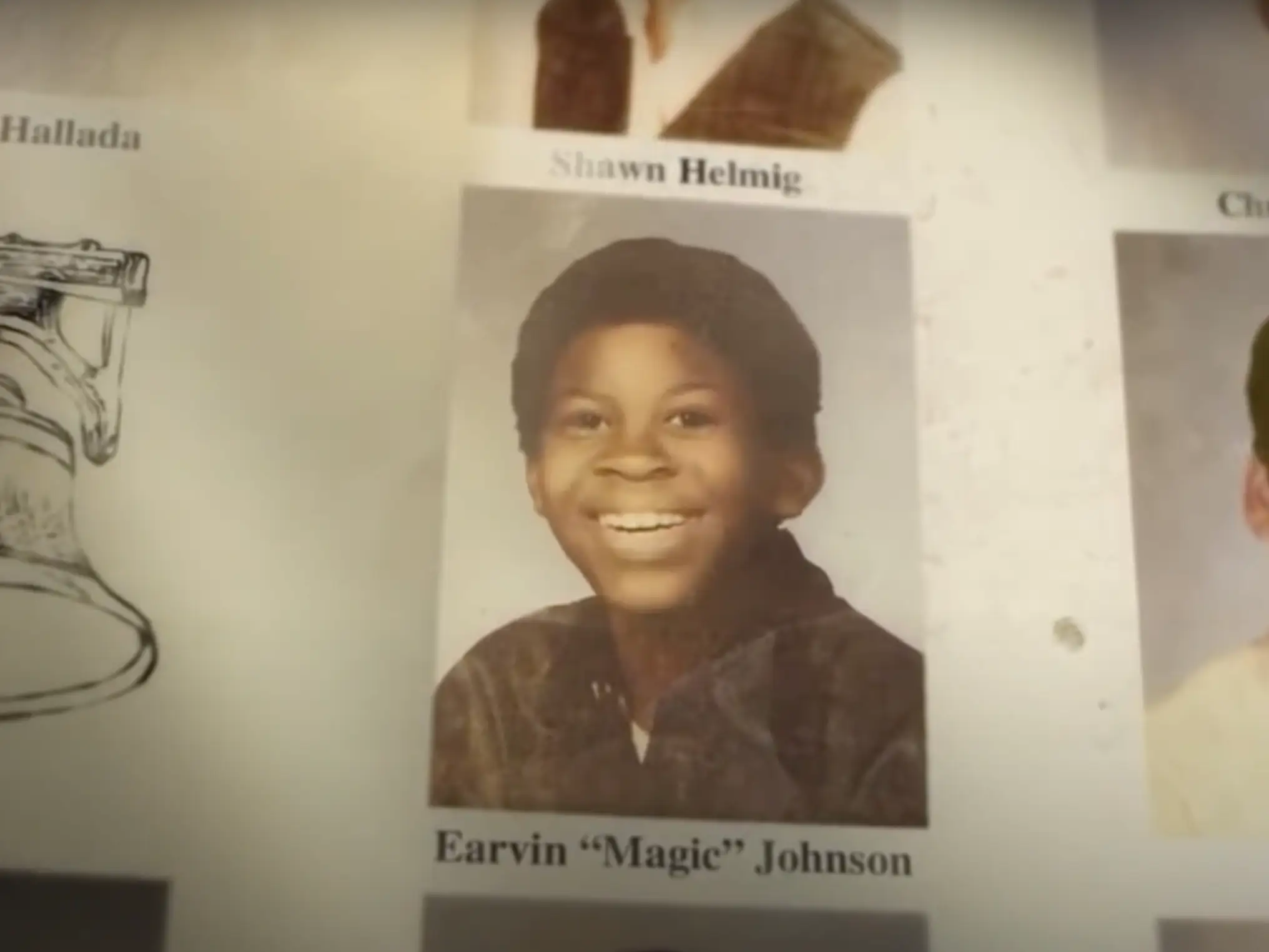 A young Magic Johnson's yearbook photo.