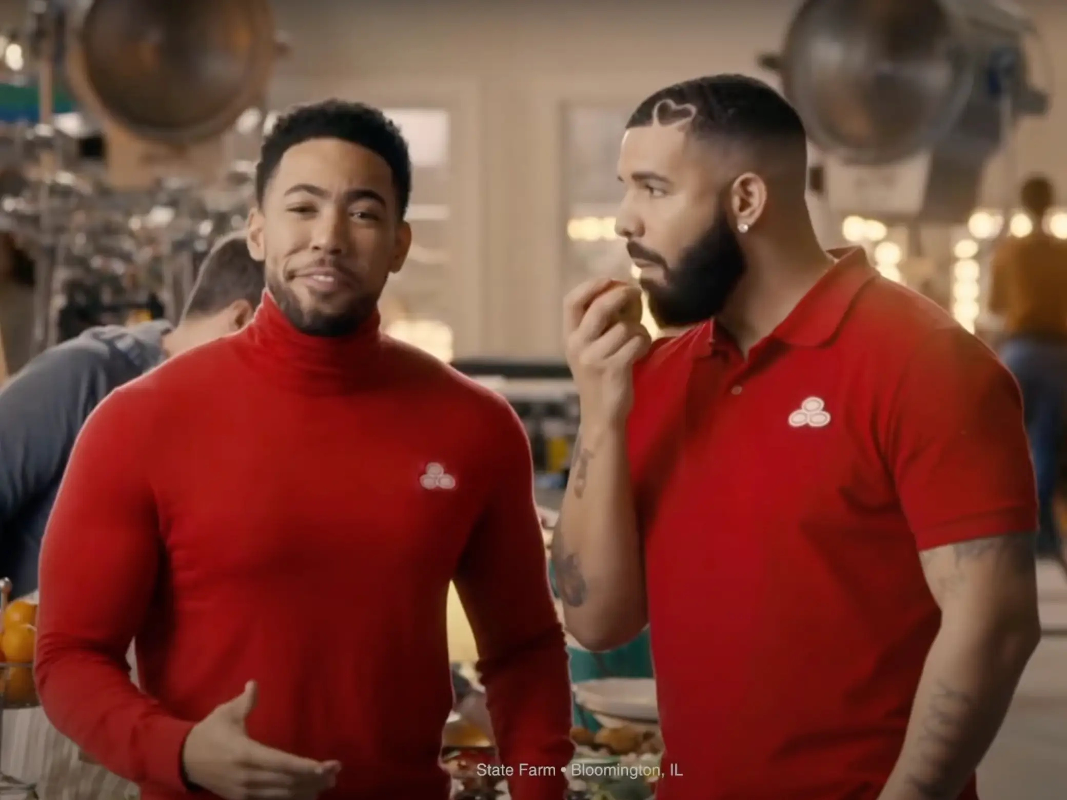 Jake from State Farm and Drake wearing State Farm apparel.