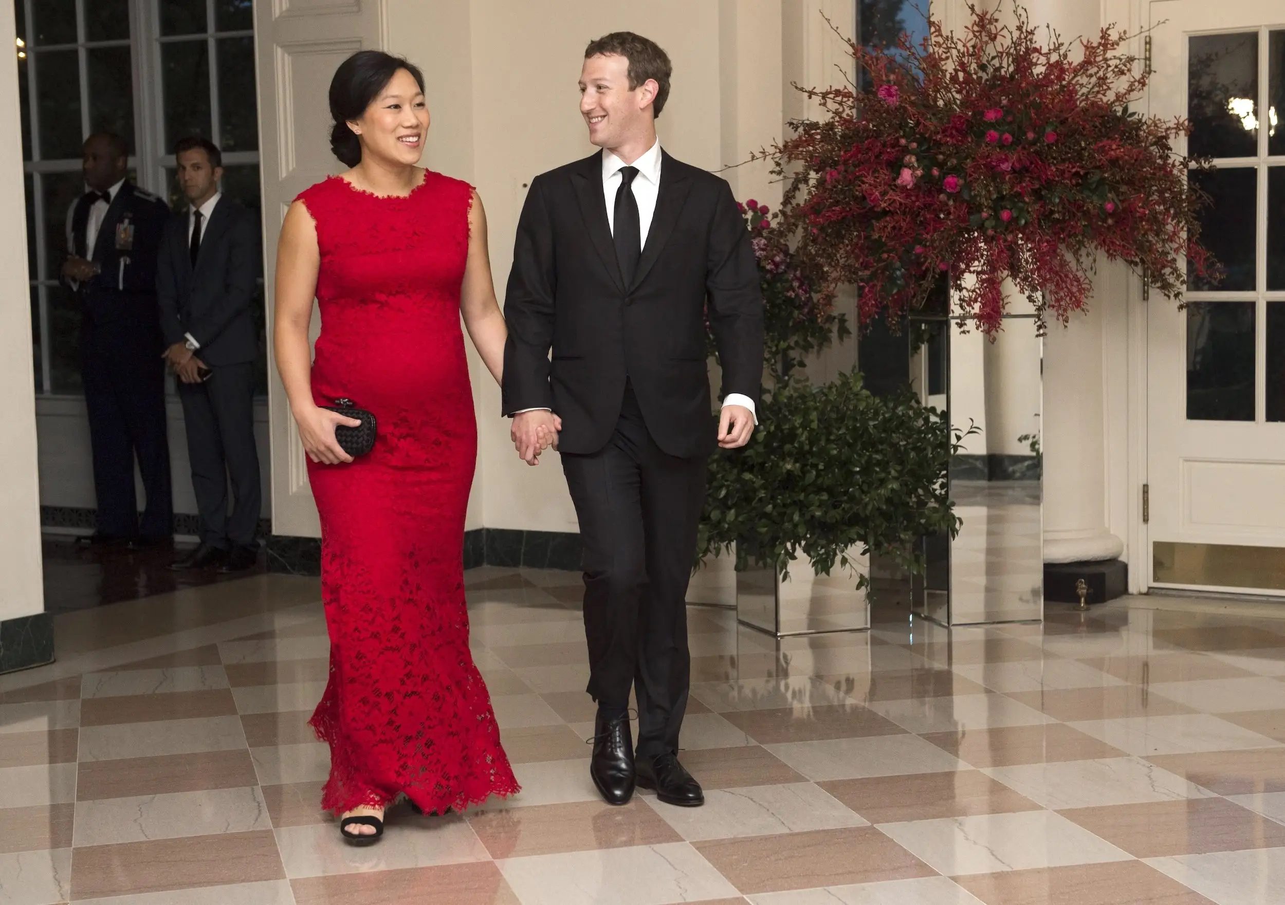 Priscilla Chan and Mark Zuckerberg attend a White House state dinner in 2015.