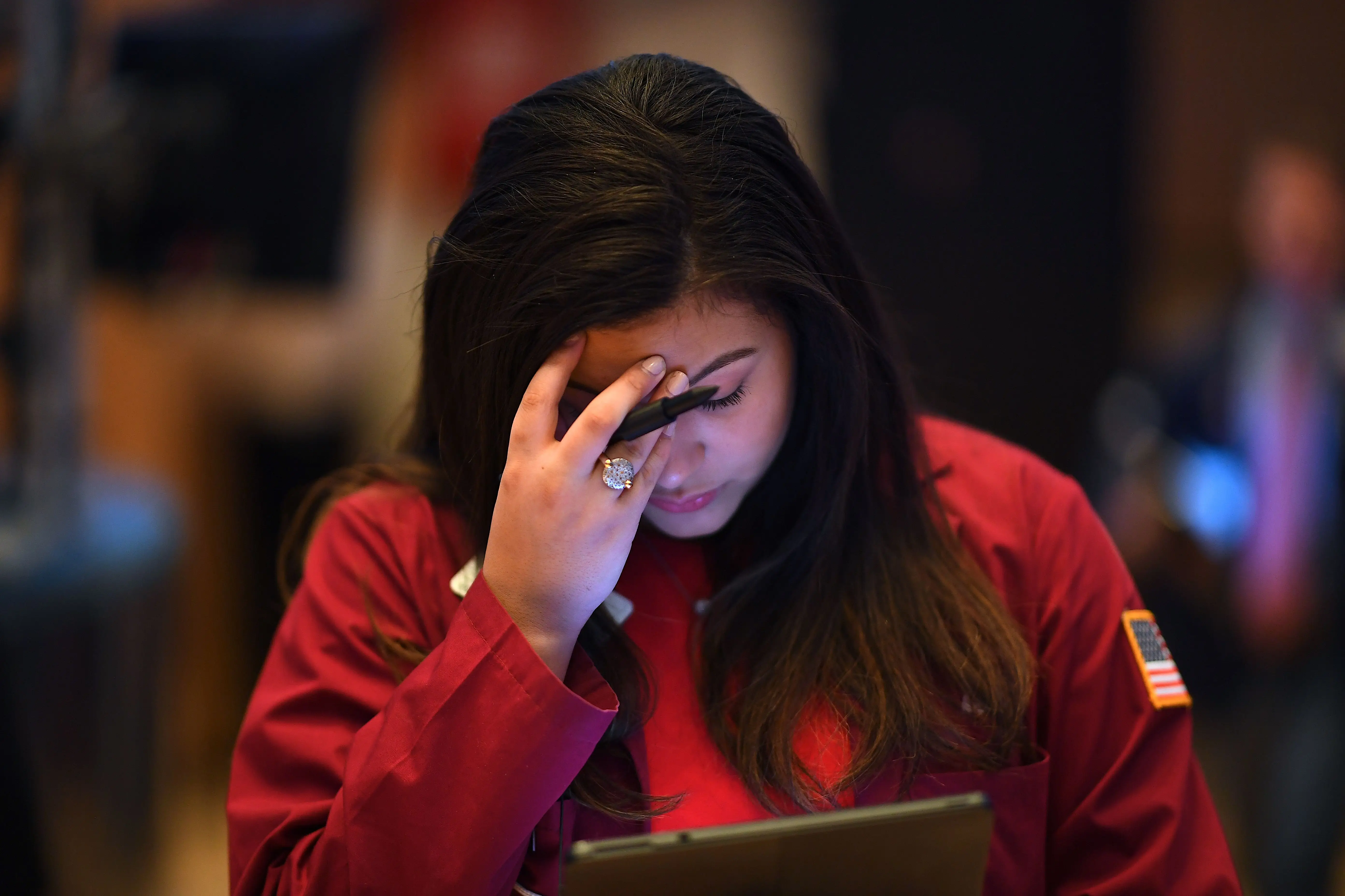 A trader reacts during the opening bell at the New York Stock Exchange (NYSE) on February 28, 2020 at Wall Street in New York City
