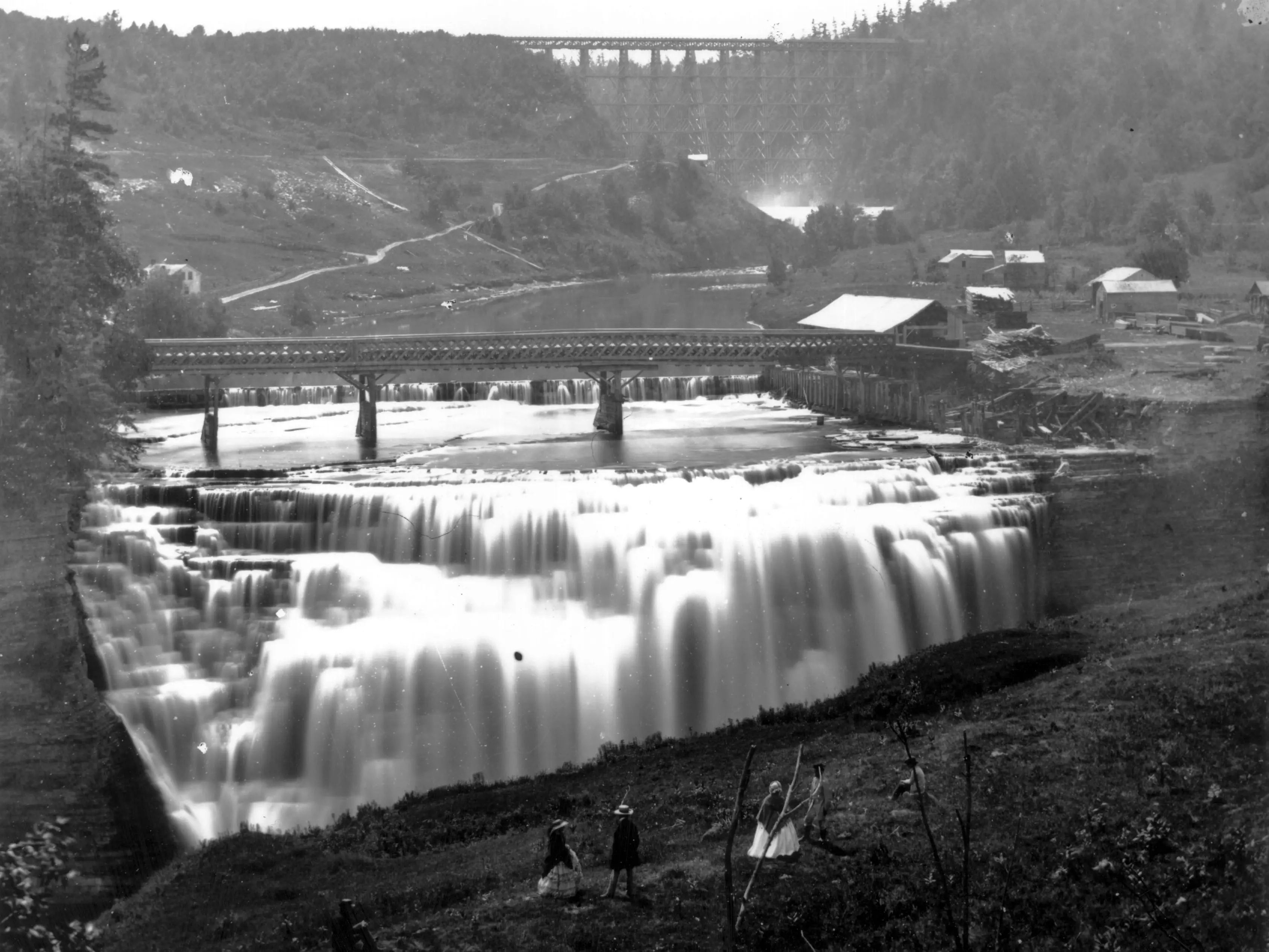 A waterfall on the Genesee River in Rochester, New York State. The High Bridge can be seen in the background