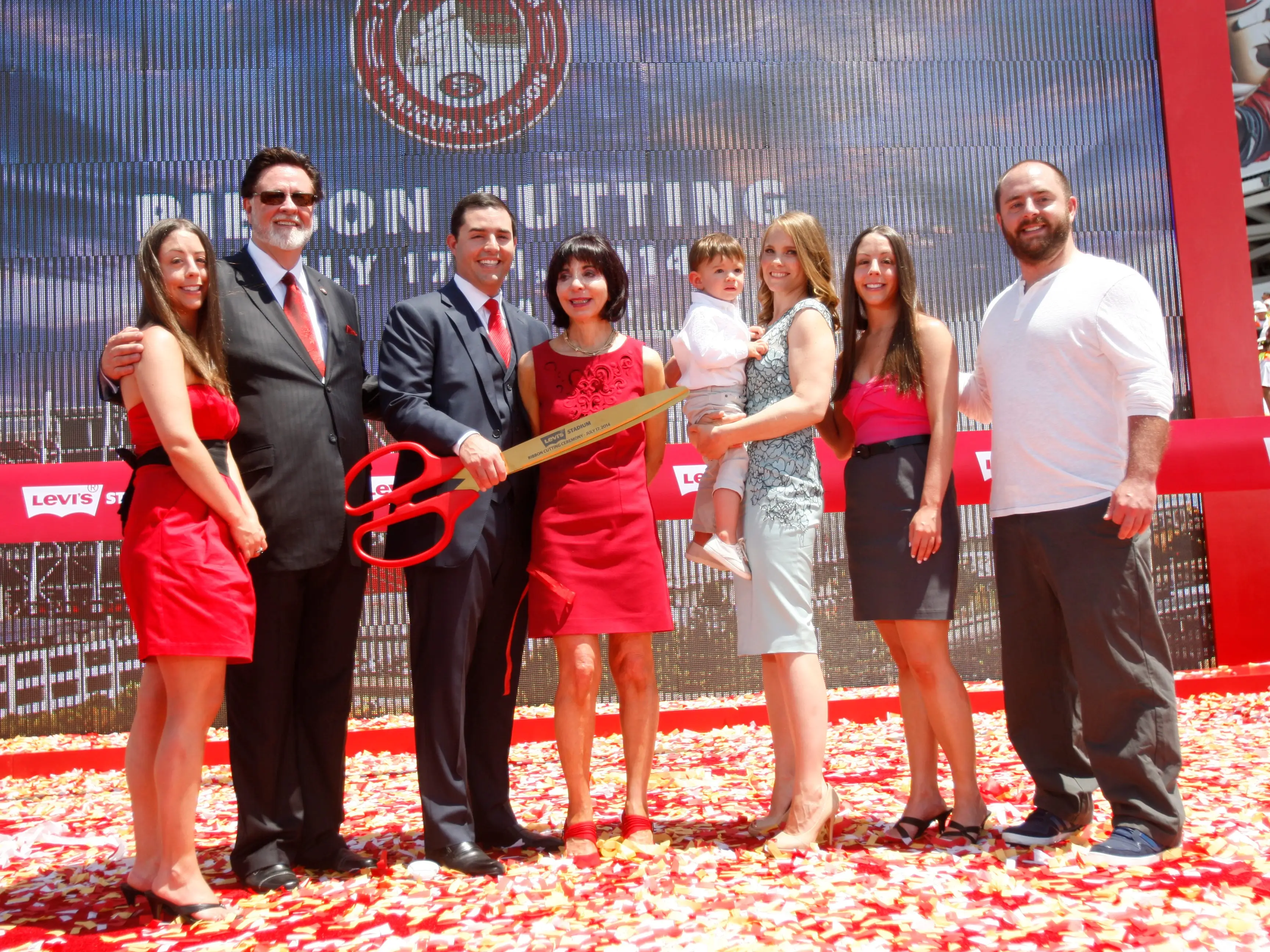 Denise DeBartolo York (center) and family at the ribbon cutting ceremony for Levi Stadium in 2014.