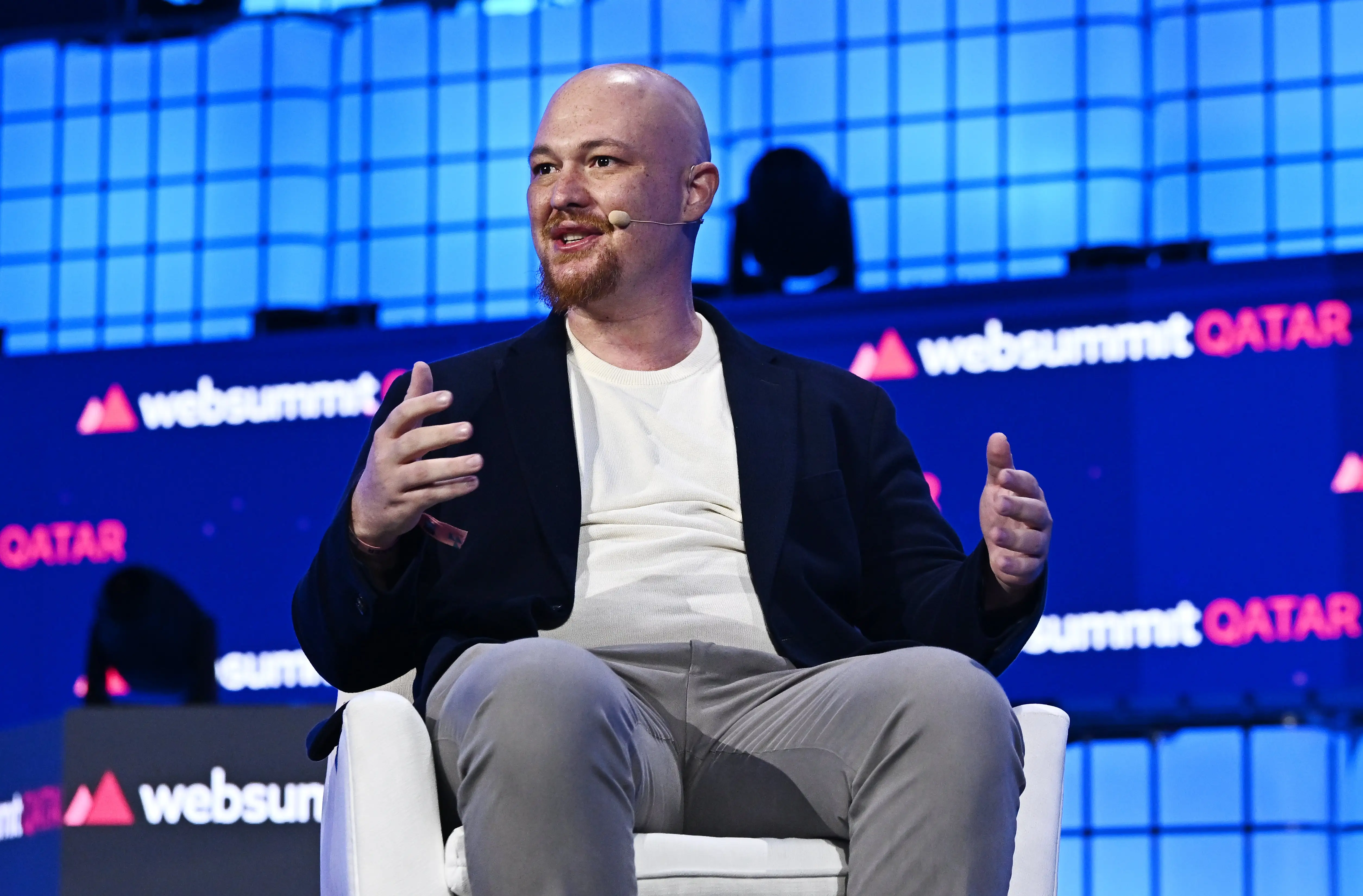 Amjad Masad, Co-founder & CEO, Replit on Centre Stage during the opening night of Web Summit Qatar 2024 at the Doha Exhibition and Convention Center in Doha, Qatar.