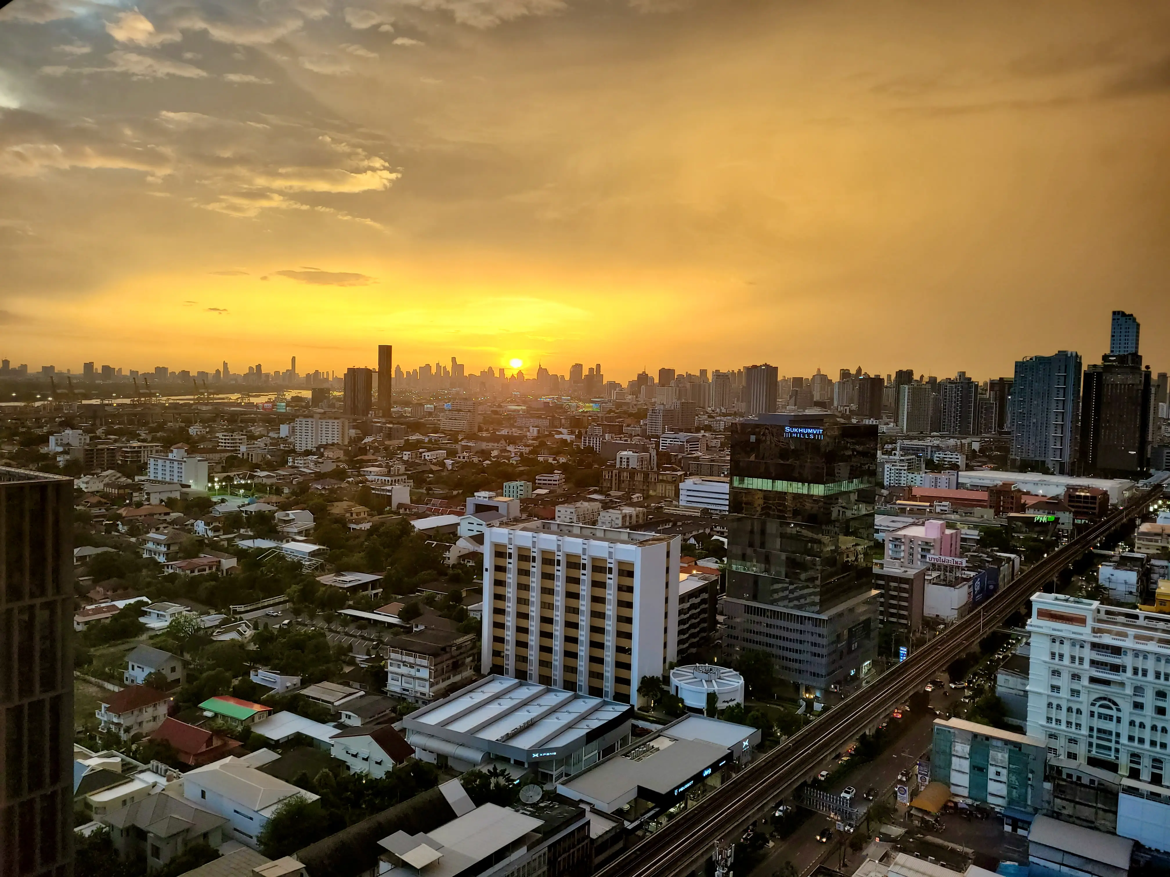 Sunset view over Bangkok skyline.