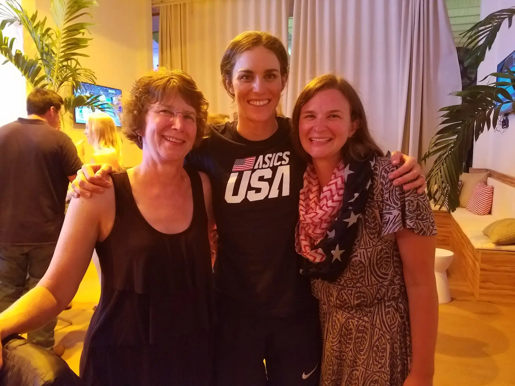 The author and her two daughters celebrating at USA House.