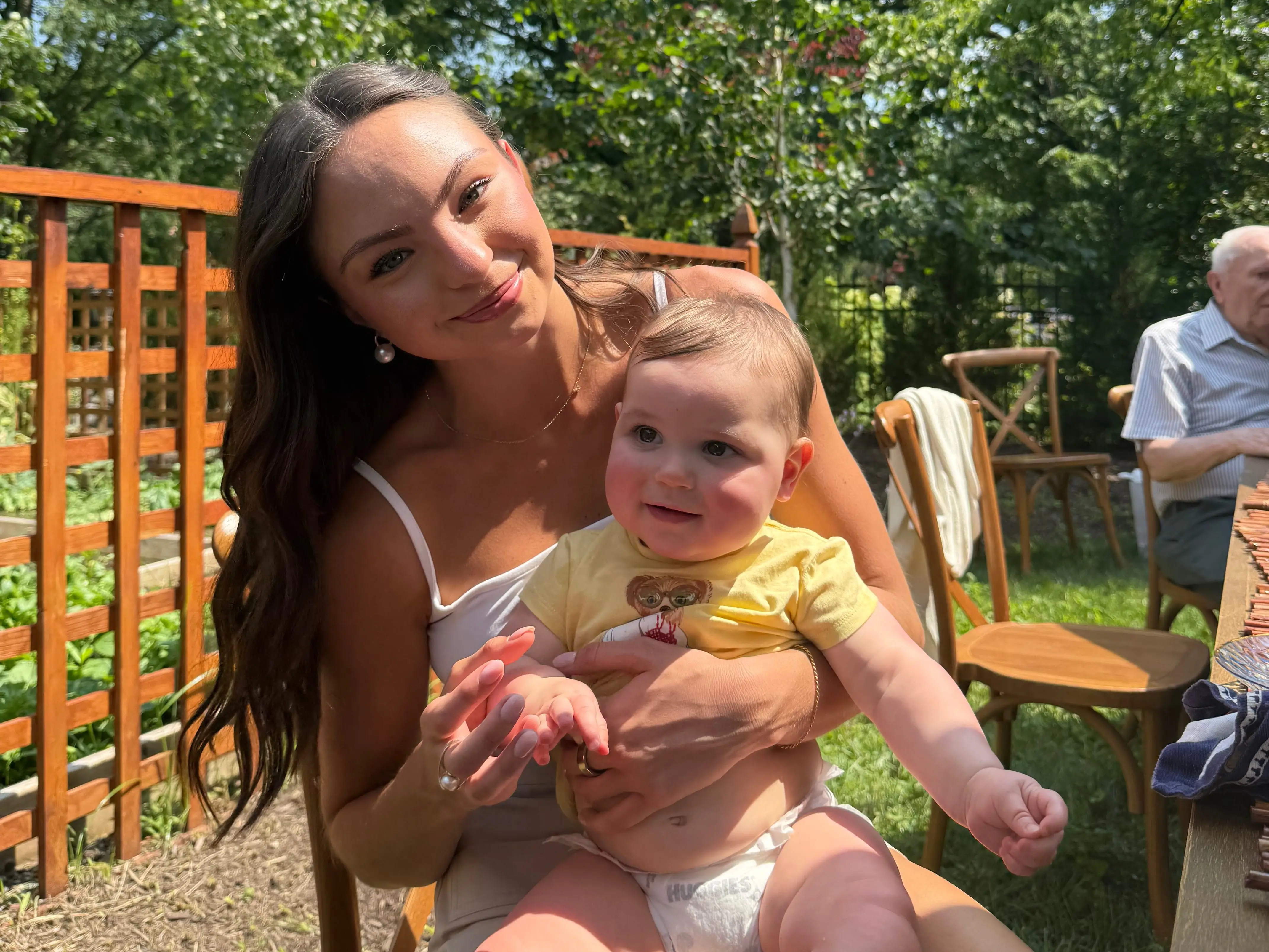 Nadya Grisczenkow holding baby