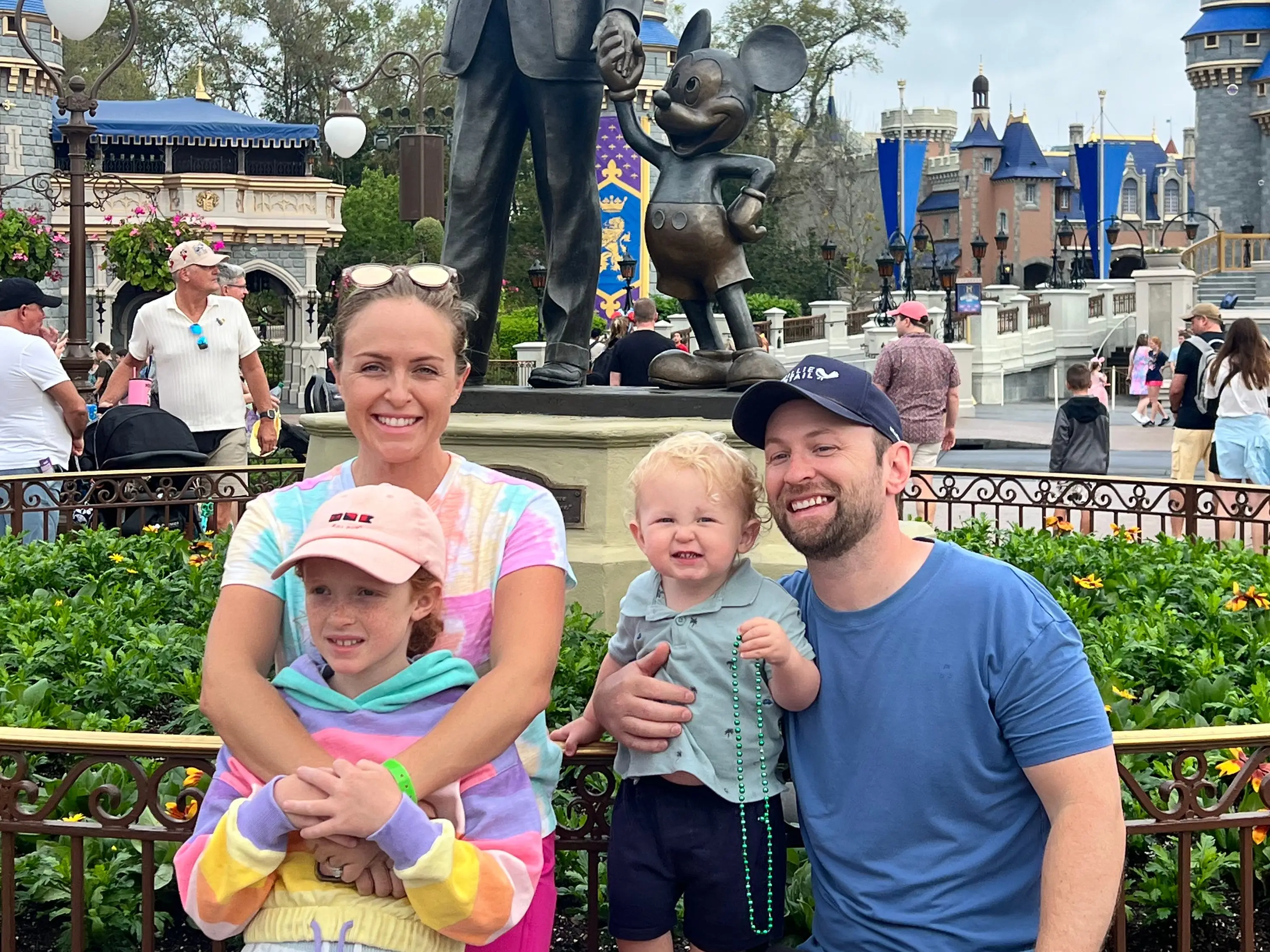 Family posing at Disney