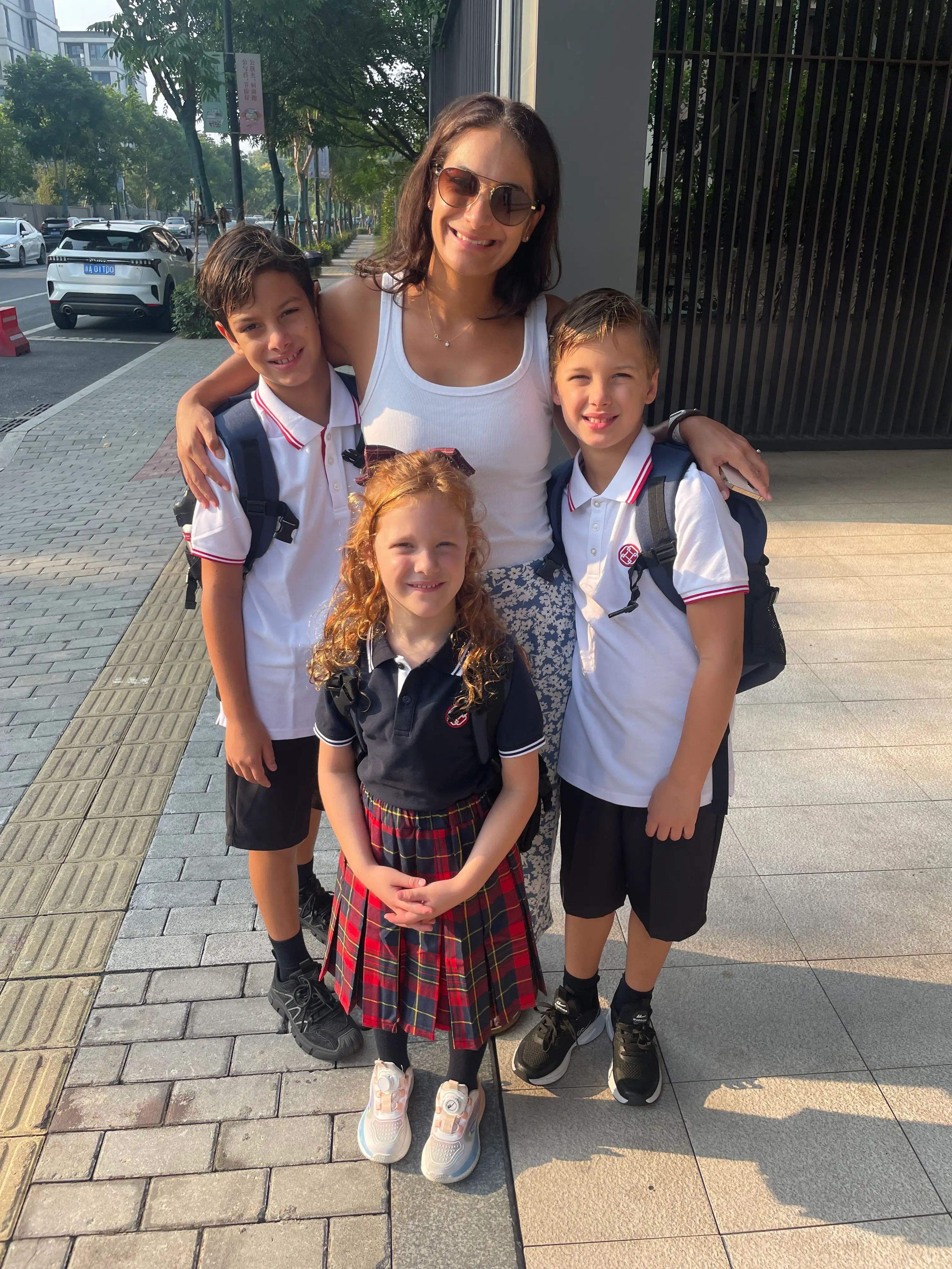 A woman and her three kids in China.