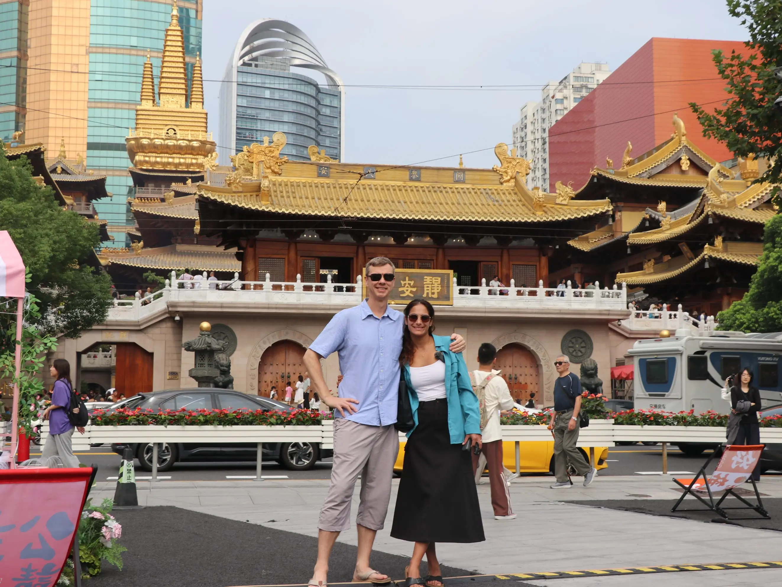 A couple in front of a temple in Shanghai.