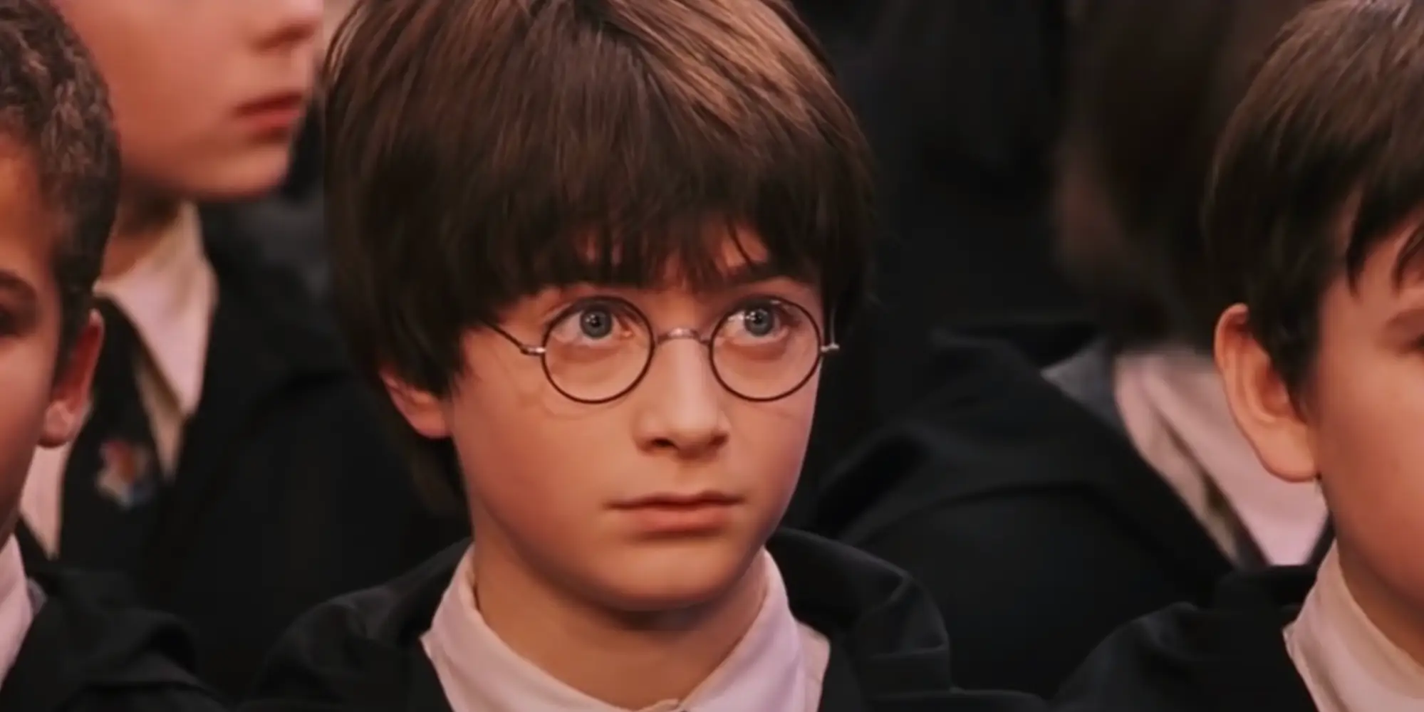 Daniel Radcliffe as Harry Potter and Matthew Lewis as Neville Longbottom in 