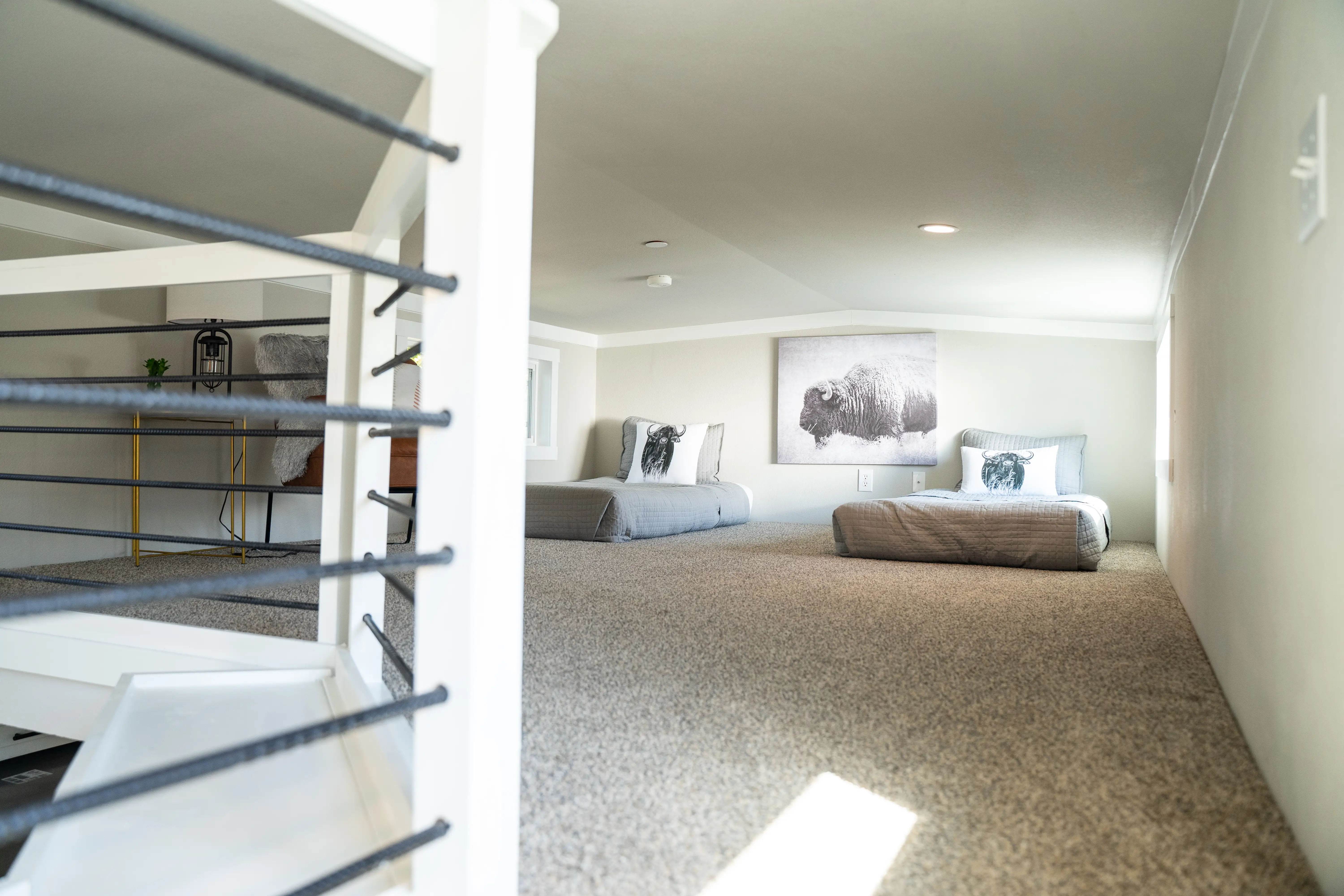 A lofted bedroom in a tiny home.