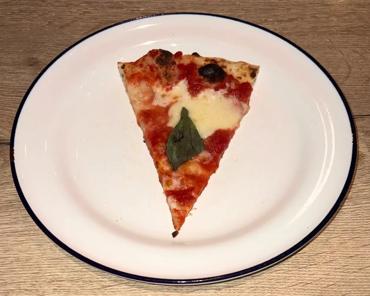 The Margherita slice at Gordon Ramsay's Street Pizza in Dubai.